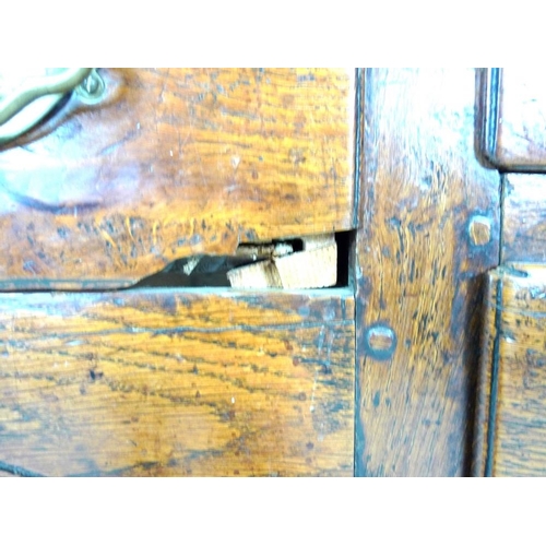 927 - A Georgian oak sideboard, later two shelf plate rack with trefoil detailing to the corners, the base... 