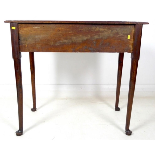 929 - A George I oak lowboy, with single drawer, brass drop handles, raised on turned and tapering legs wi... 