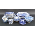 A mixed group of blue and white ceramics, predominantly in the Willow pattern, 18th century and late... 