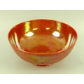 A Ruskin Pottery orange lustre bowl, early 20th century, impressed marks to base, 23cm diameter.