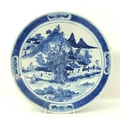 A Chinese export ware blue and white porcelain charger, 19th century, hand painted with central stra... 