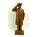 A carved wood figure of a Chelsea pensioner on a square wooden base, marked 'P, 74' to base, 22cm hi... 