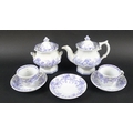 A late Victorian Empire Porcelain & Co child's tea set, decorated in transfer print blue and white w... 