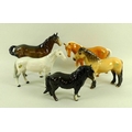 A group of five Beswick figurines, each modelled as a horse, comprising Highland Pony in Dun 'Mackio... 