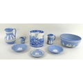 A late 19th century Adams, Tunstall, cachepot, with moulded borders decorated in blue and white tran... 