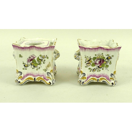 562 - A pair of French faience Veuve Perrin porcelain candle holders, late 18th century, of cubic form wit... 