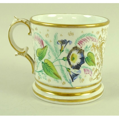 564 - A porcelain tankard, probably Coalport, 19th century, decorated with floral sprays and gilded highli... 