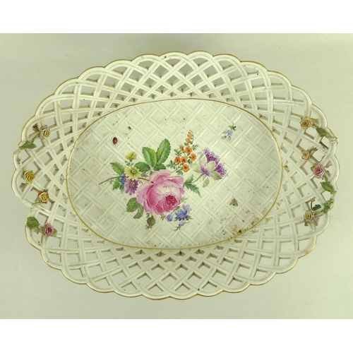 567 - A Meissen porcelain basket, 19th century, of oval form with lattice moulding and piercing, externall... 