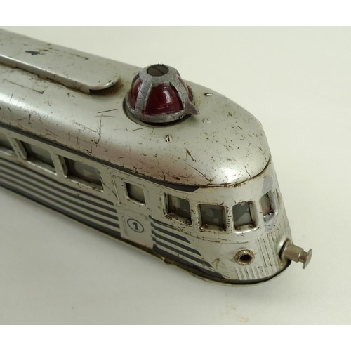 696 - A Joustra, Made in France, O gauge, tin plate three section 'Autorail' streamlined train, 2-4-2, cir... 