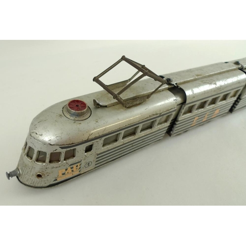 696 - A Joustra, Made in France, O gauge, tin plate three section 'Autorail' streamlined train, 2-4-2, cir... 