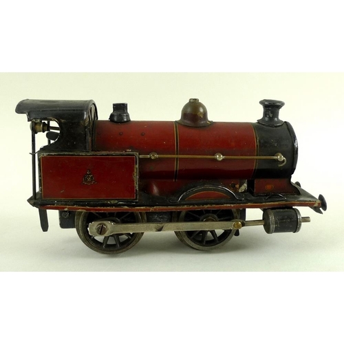 698 - An A. W. Gamage, Holborn, London, made in Germany, O gauge tin plate 0-4-0 tank loco, early 20th cen... 