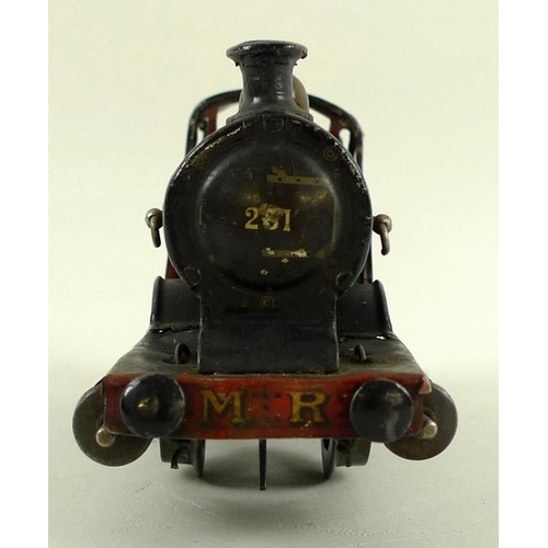 698 - An A. W. Gamage, Holborn, London, made in Germany, O gauge tin plate 0-4-0 tank loco, early 20th cen... 