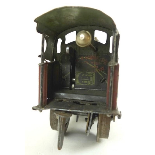 698 - An A. W. Gamage, Holborn, London, made in Germany, O gauge tin plate 0-4-0 tank loco, early 20th cen... 