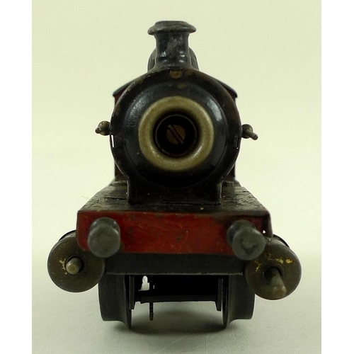 699 - A Marklin O gauge tin plate 0-4-0 tank loco, early 20th century, electric 3-rail, maroon with black ... 