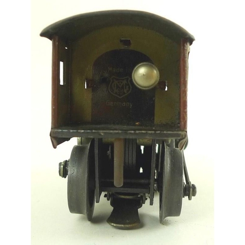 699 - A Marklin O gauge tin plate 0-4-0 tank loco, early 20th century, electric 3-rail, maroon with black ... 