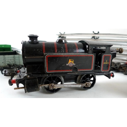 701 - A Hornby Meccano Ltd, O gauge, tinplate clockwork train set, comprising 0-4-0 tank engine Type 40, b... 