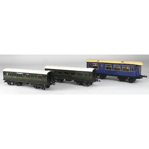 702 - A group of Hornby O gauge tinplate passenger coaches, comprising  C19, GWR, 6857, twin bogie, yellow... 