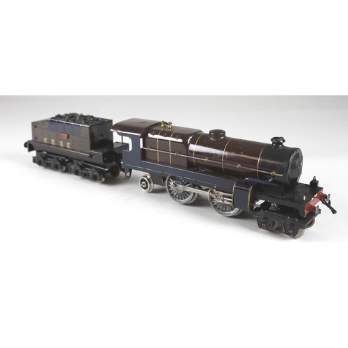 703 - A Hornby O gauge Nord 4-4-2 tank loco, clockwork, 1200, repainted brown with black, dark blue and go... 