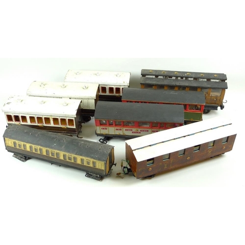 710 - A group of three large scale 2.75 inch coaches, circa 1930, comprising two First Class passenger coa... 