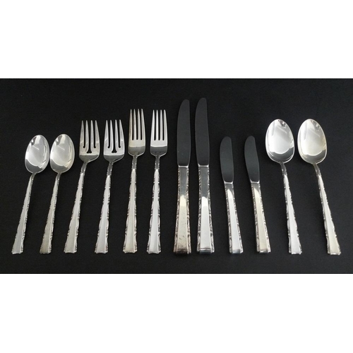 810 - Two bachelor's sets of Lunt sterling silver Madrigal pattern cutlery, the knives with stainless stee... 