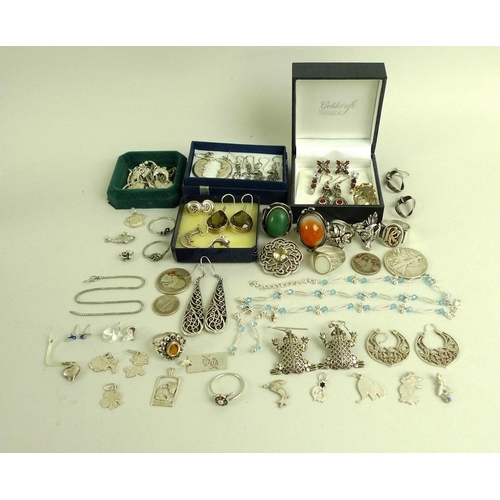 821 - A large selection of mostly silver jewellery, including rings, necklaces and earrings, together with... 