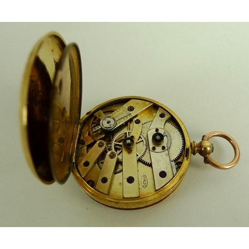 824 - An 18K gold cased lady's pocket watch, late 19th century, open faced, key wind, floral engraved dial... 