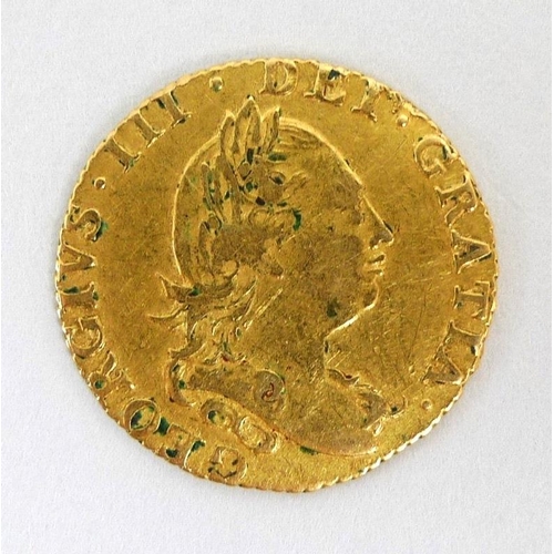 834 - A George III gold half guinea, dated 1784, 4.4g.