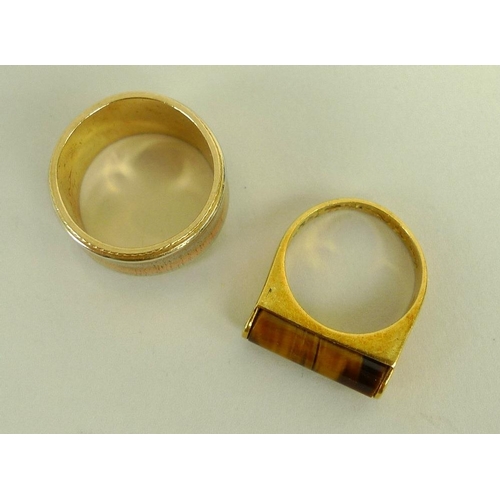 837 - An 18ct gold ring set with a cylinder cut tiger's eye, size 'L', 6.4g, together with a 14ct gold tri... 