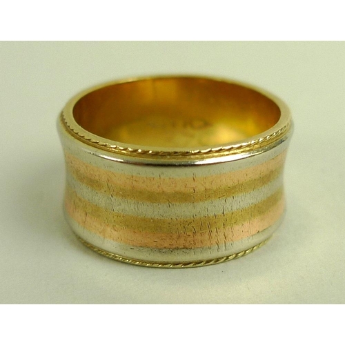 837 - An 18ct gold ring set with a cylinder cut tiger's eye, size 'L', 6.4g, together with a 14ct gold tri... 