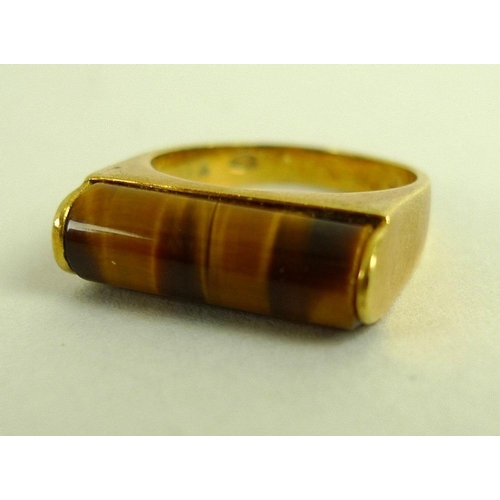 837 - An 18ct gold ring set with a cylinder cut tiger's eye, size 'L', 6.4g, together with a 14ct gold tri... 