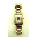 A gentleman's dress watch with rectangular face, the frame studded with forty six small diamonds, wi... 