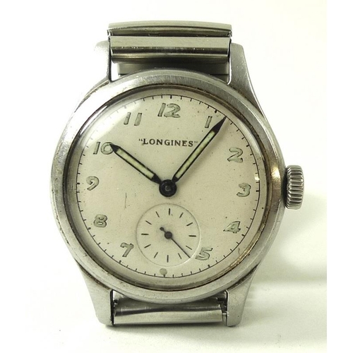 856 - A gentleman's vintage Longines wristwatch, circa 1940, the cream dial with Arabic numerals with lumi... 