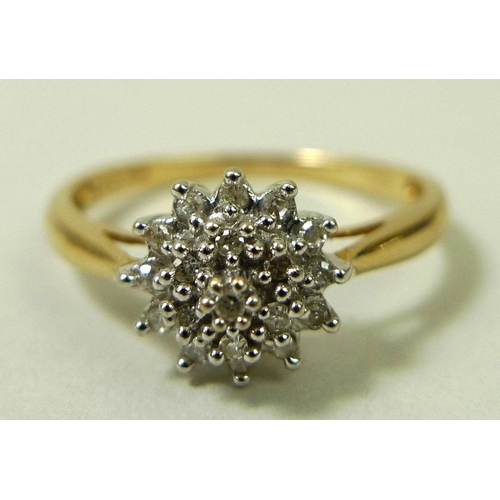 860 - A 9ct gold and diamond dress ring, with starburst illusion set diamonds, size P, total weight 1.7g.