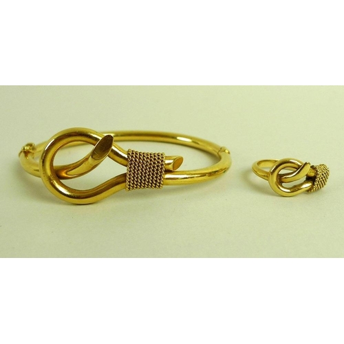 866 - An 18ct gold bangle and matching ring, size L, modelled as a slip-knot, by Greek jewellery designer ... 