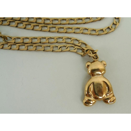 867 - A 9ct gold 'Teddy' bear pendant with chain, together with a 9ct gold dolphin pendant and chain, 23.7... 