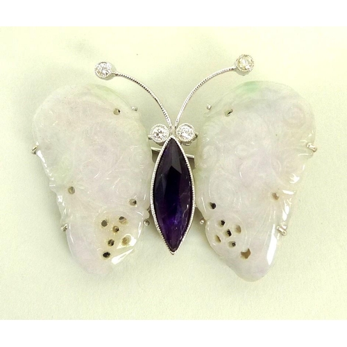 868 - A mutton fat jade brooch, formed as a butterfly, set with with diamond eyes and feelers and marquise... 