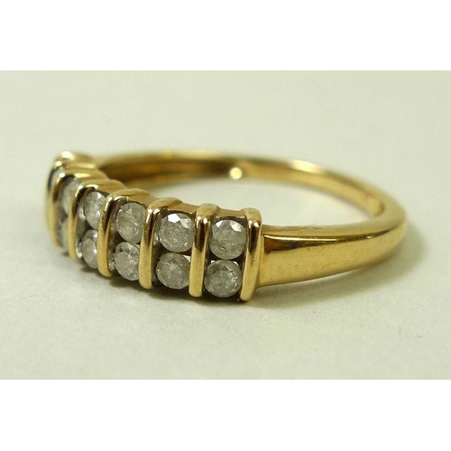 870 - A 9ct gold and diamond ring, the 14 diamonds set in two rows, total approximately 0.5ct, size P, wei... 