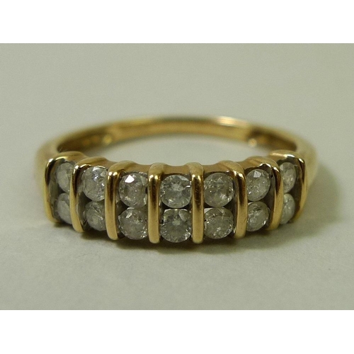 870 - A 9ct gold and diamond ring, the 14 diamonds set in two rows, total approximately 0.5ct, size P, wei... 