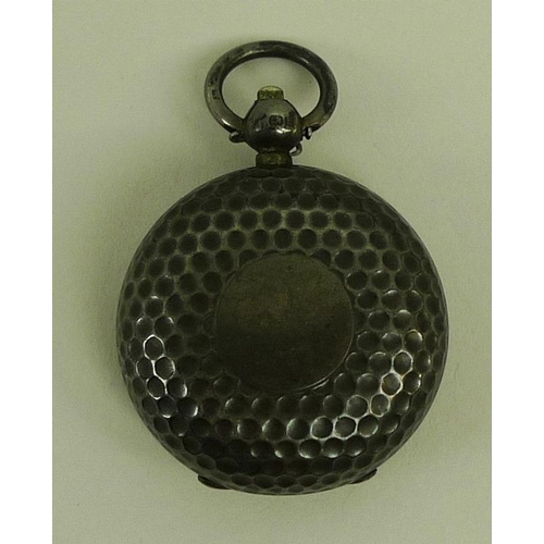 872 - An Edwardian novelty silver coin holder, probably for sovereigns, the exterior resembling a golf bal... 