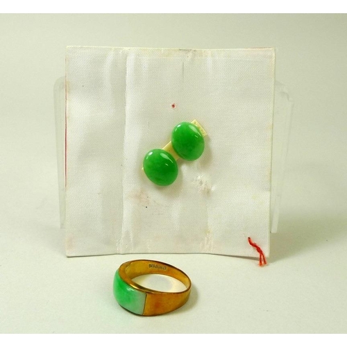 873 - An 18ct gold ring set with green apple jade, size M/N, 3.6g, together with a pair of apple jade unse... 