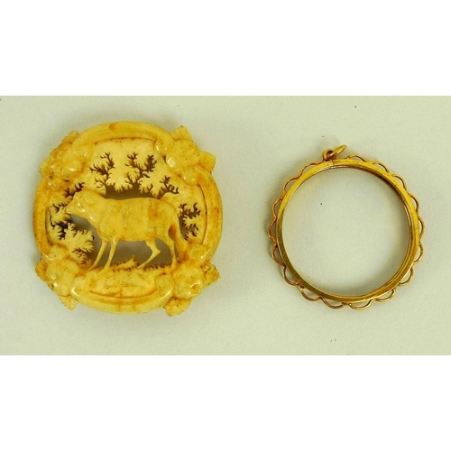 875 - A 9ct gold coin or medallion pendant holder, 3.2g, together with a Victorian carved bone brooch, a/f... 