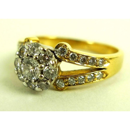 890 - A 22ct gold and diamond ring, the yellow gold band with split shoulders and white gold flowerhead se... 