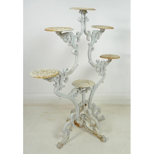 895 - A cast iron Coalbrookdale style candelabra jardiniere stand, late 20th century, with six circular st... 