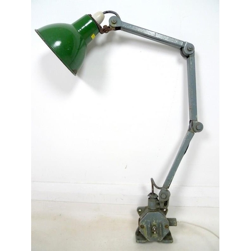 897 - A machinist-engineer's adjustable work-lamp, circa 1930's, articulated cantilever structure, cast ir... 