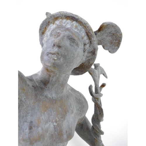 899 - A cast metal statue of Hermes/Mercury, the winged messenger, late 20th century, modelled standing on... 