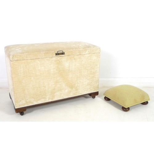 913 - An ottoman covered in cream velvet linen and raised on castors, 93 by 42 by 63cm high, together with... 