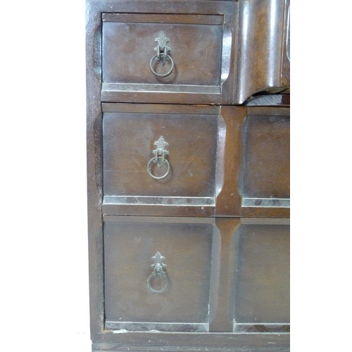 918 - A mahogany dressing chest, mid 20th century, with Gothic style pointed arch mirror on turned support... 