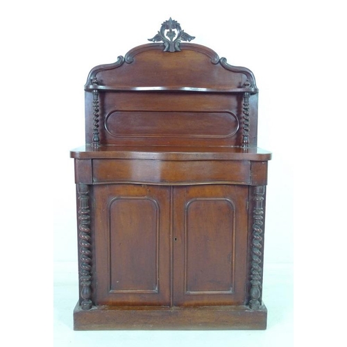 921 - A Victorian mahogany chiffonier, the gallery back with carved surmount and single shelf, below twin ... 