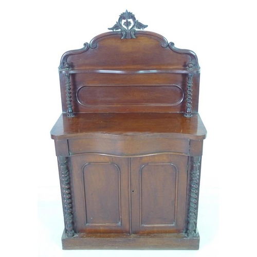 921 - A Victorian mahogany chiffonier, the gallery back with carved surmount and single shelf, below twin ... 