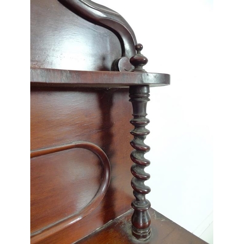 921 - A Victorian mahogany chiffonier, the gallery back with carved surmount and single shelf, below twin ... 